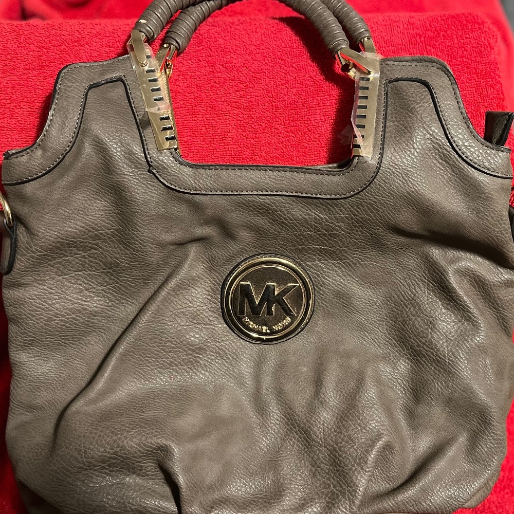 Michael Kors soft pebbled leather purse in Taupe